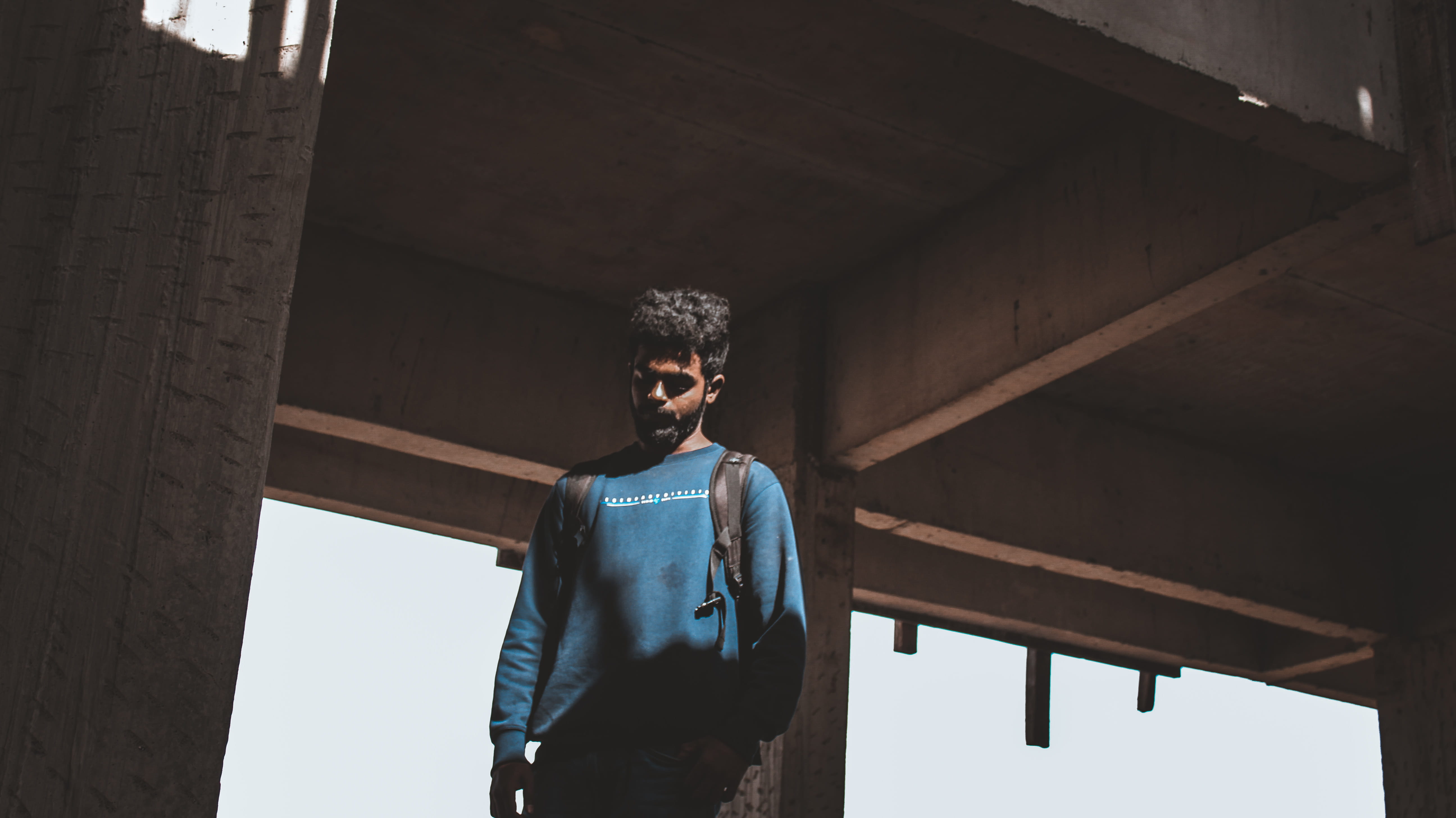 light, built structure, apparel, wearing, glasses, 5K, ceiling, home decor, adult, waist up, photography, men, clothing, man, blue, pants, handrail, human, HD Wallpaper