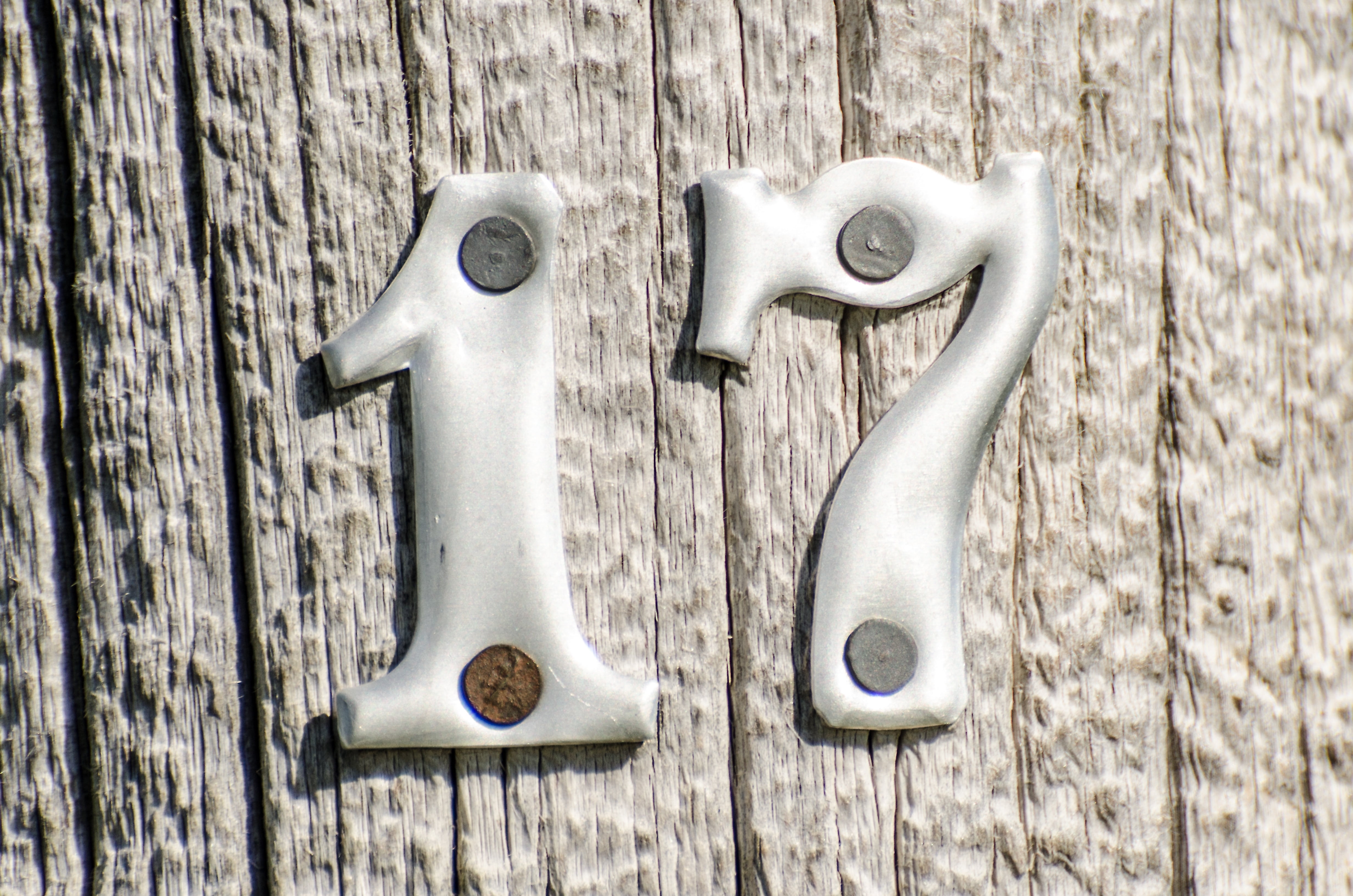 seventeen, close-up, group of objects, safety, wood - material, protection, metal numbers on post, signage, digits, rusty, no people, two objects, mounted, HD Wallpaper