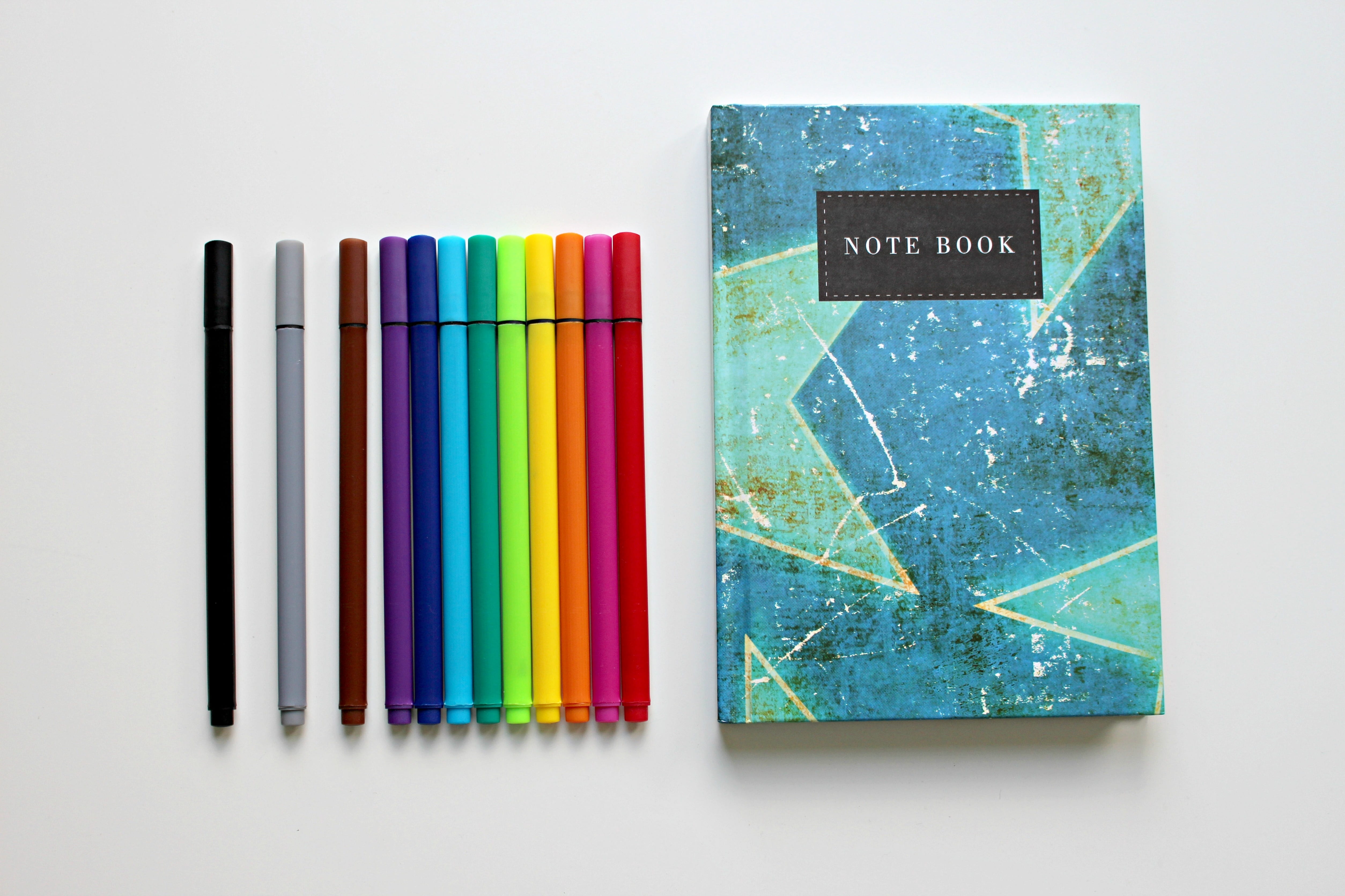 close, no people, writing accessories, large group of objects, crayons, colored, notebook, leave, color, colour pencils, assorted, colorful, teal, 4K, HD Wallpaper