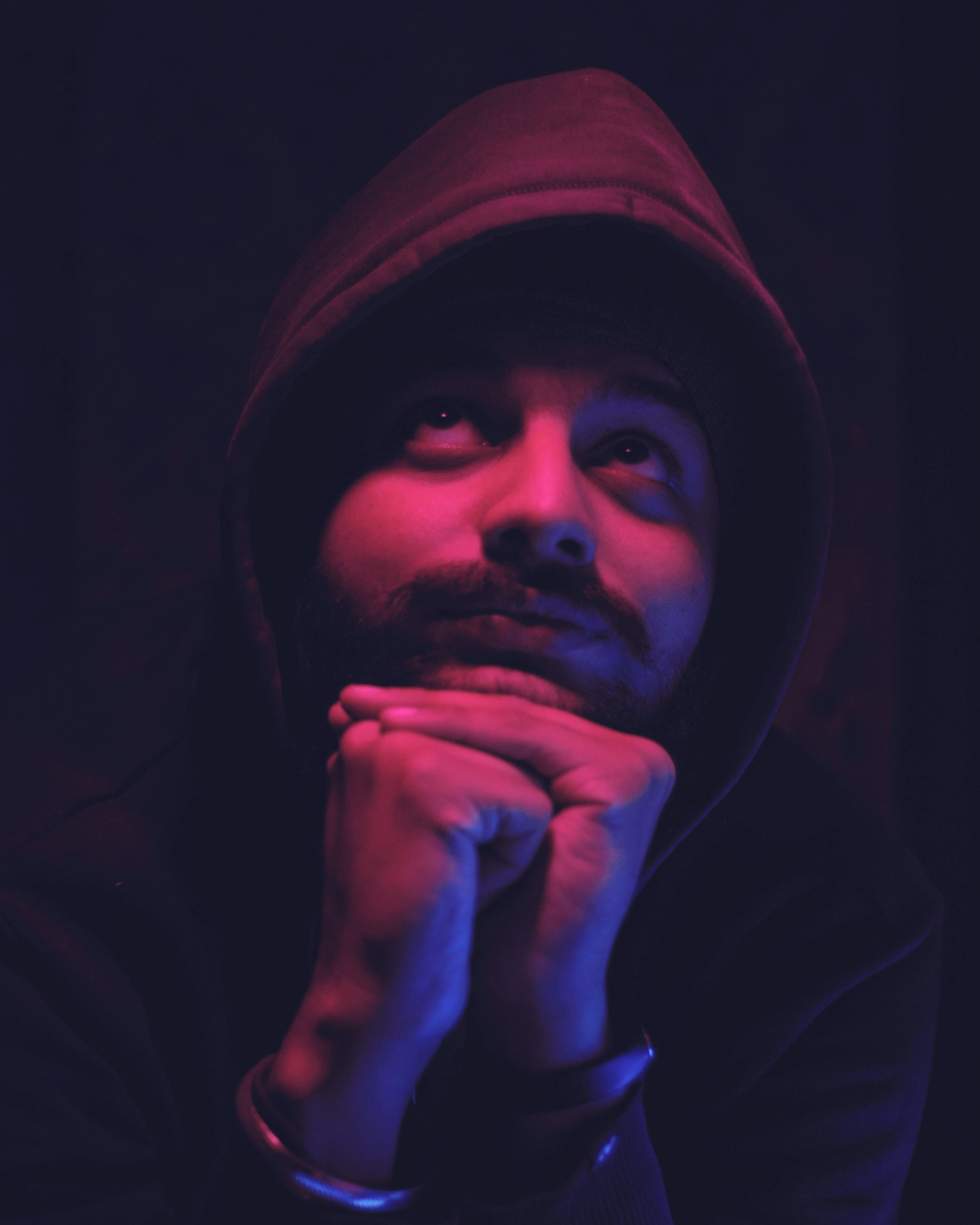 men, hope, night, contemplation, portrait, potrait, smiles, young adult, human body part, studio shot, hood - clothing, indoors, looking at camera, black background, Phone HD Wallpaper