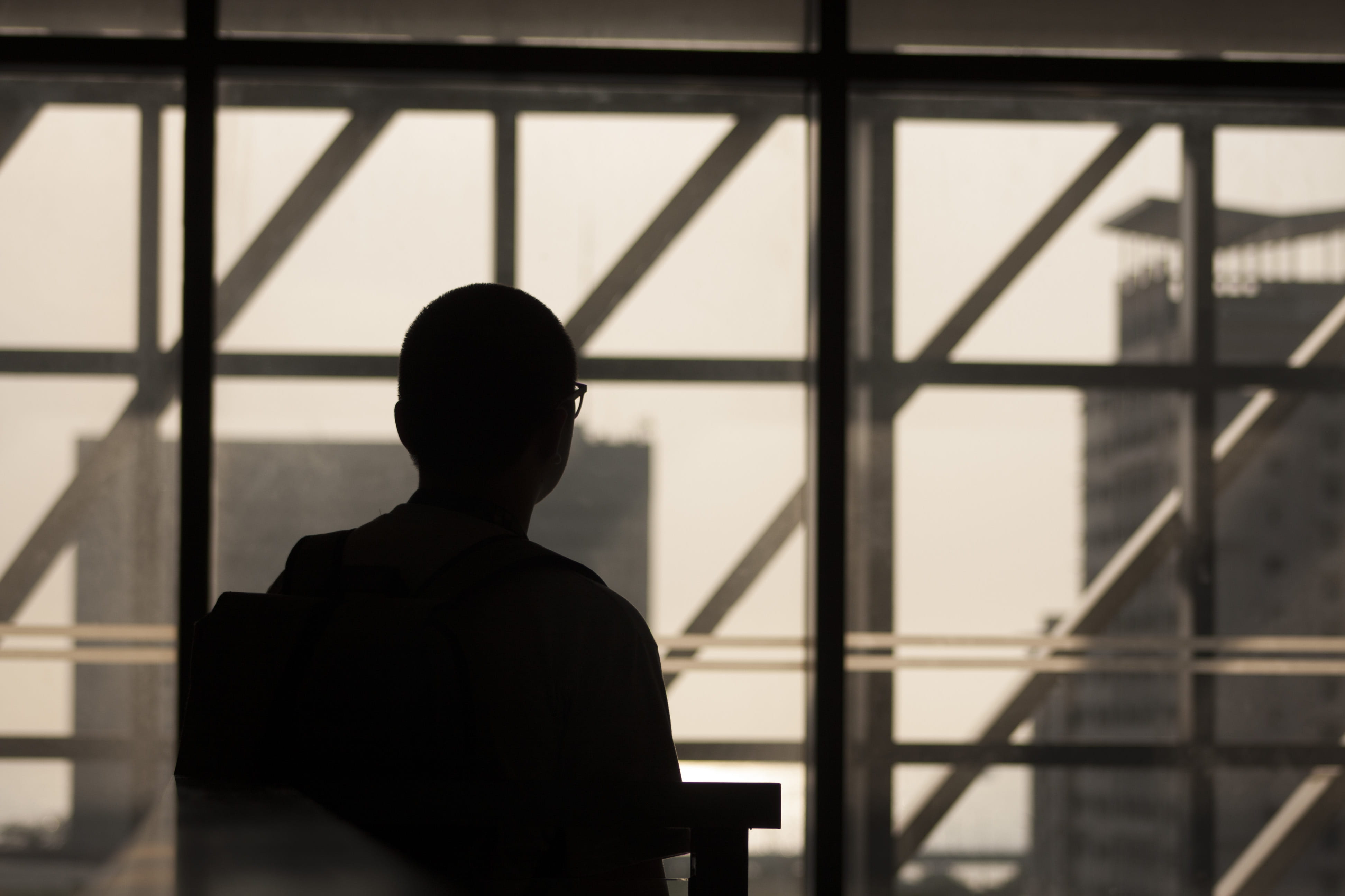 line, window, glass - material, focus on foreground, men, chair, sunlight, rear view, skyscraper, real people, architecture, waist up, one person, adult, HD Wallpaper