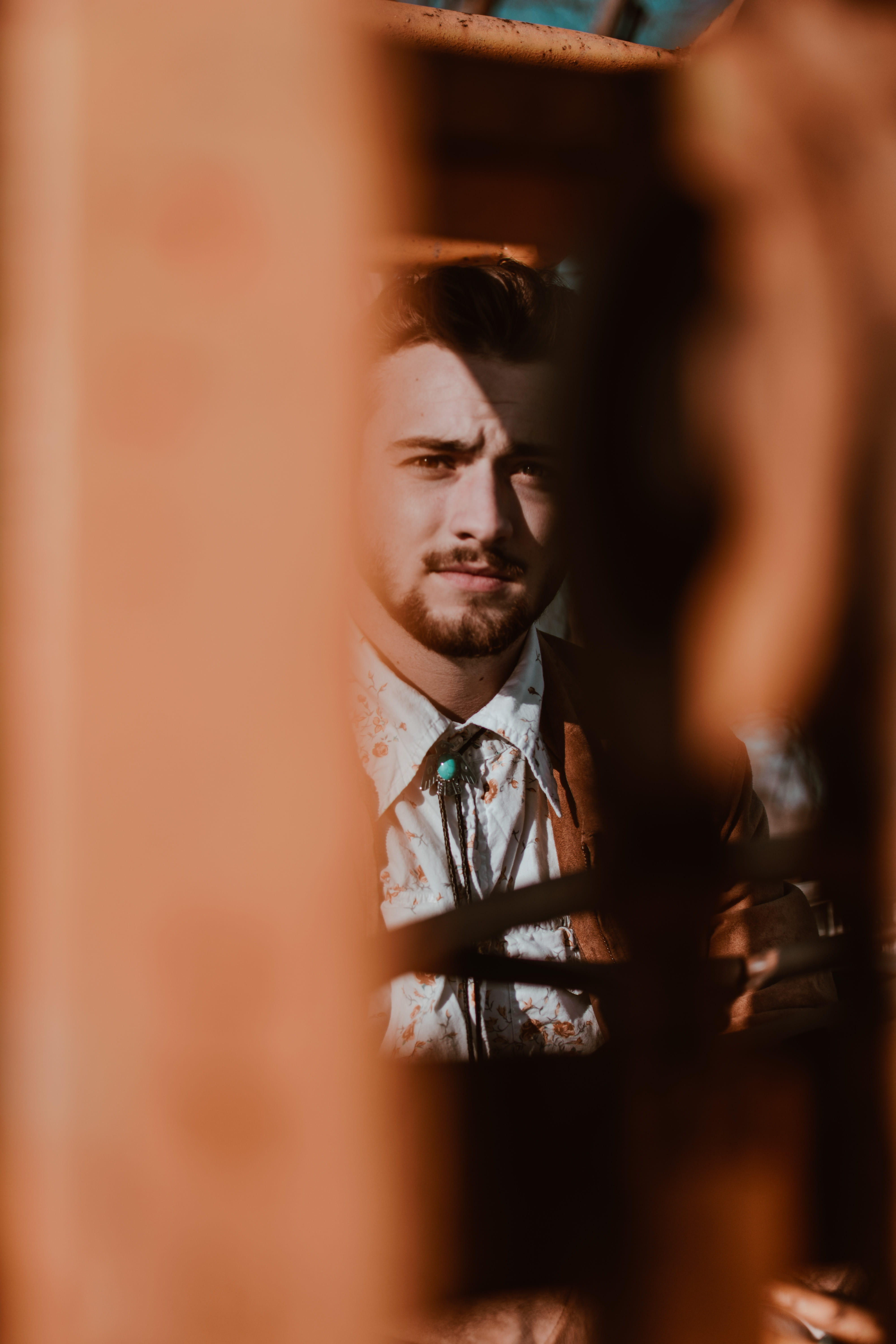 person, menswear, overcoat, portrait, man, coat, human, headshot, home decor, well-dressed, mirror, one person, face, bar counter, top, young adult, sleeve, Phone HD Wallpaper