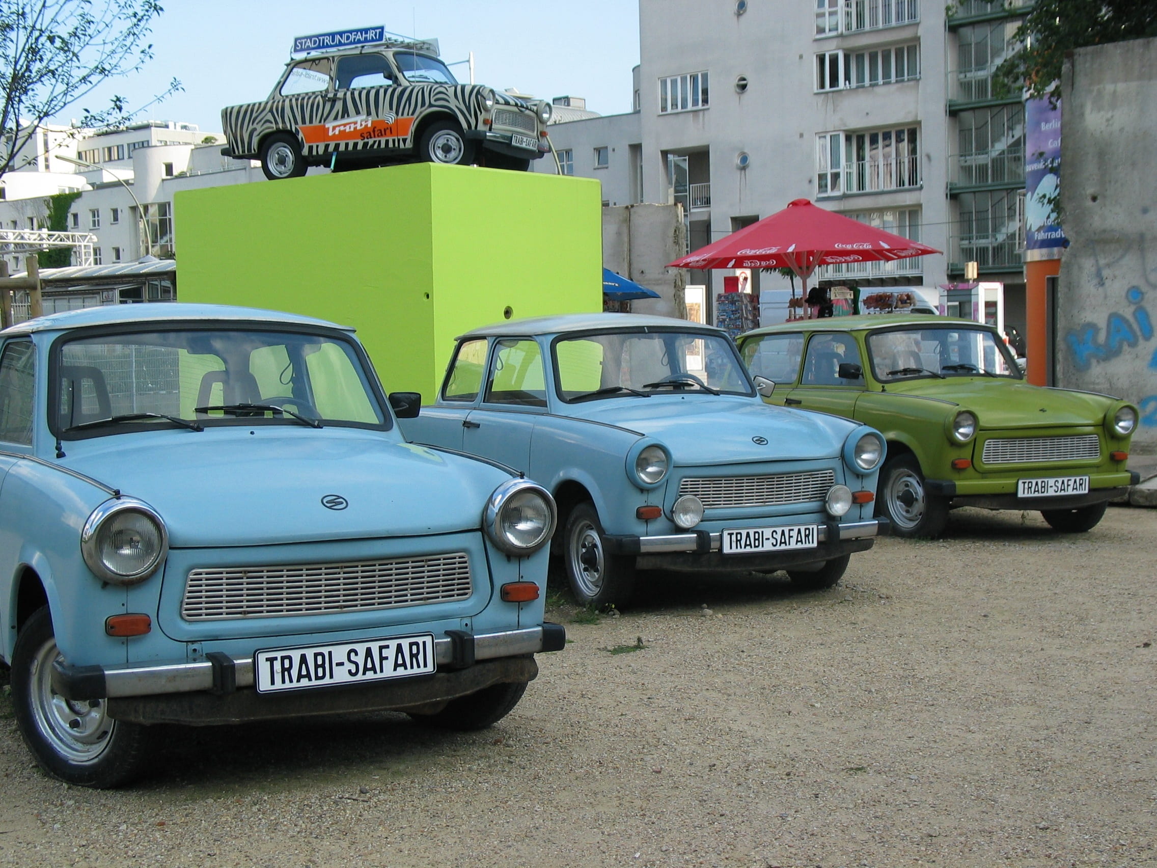 blue, mode of transportation, incidental people, stationary, car, parking, transportation, berlin, building exterior, 1080P, text, trabant, land vehicle, HD Wallpaper