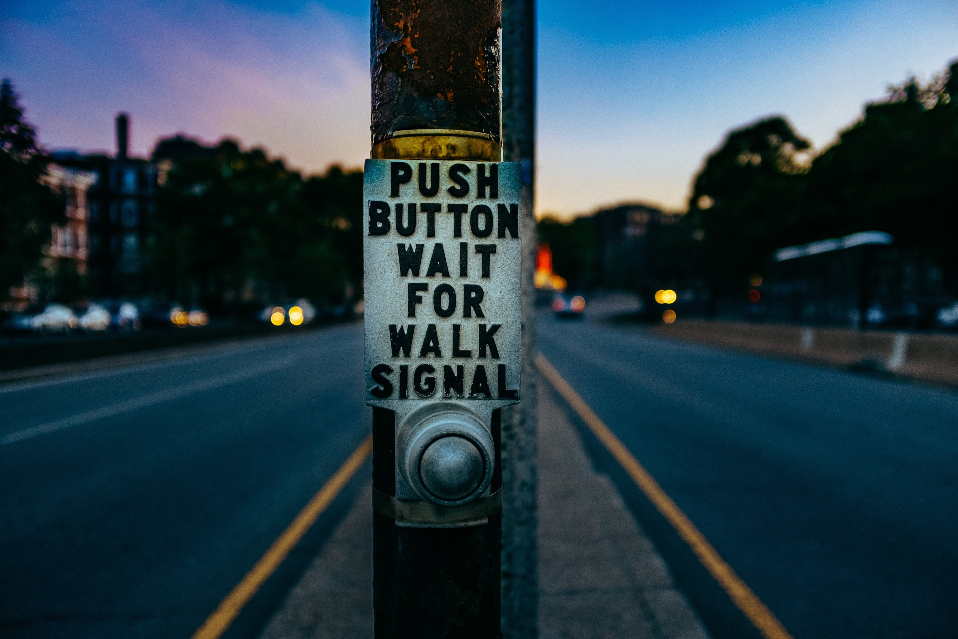 focus on foreground, guidance, signal, building exterior, inscription, push button, text, car, city, outdoors, street, button, sunset, no people, walk, HD Wallpaper