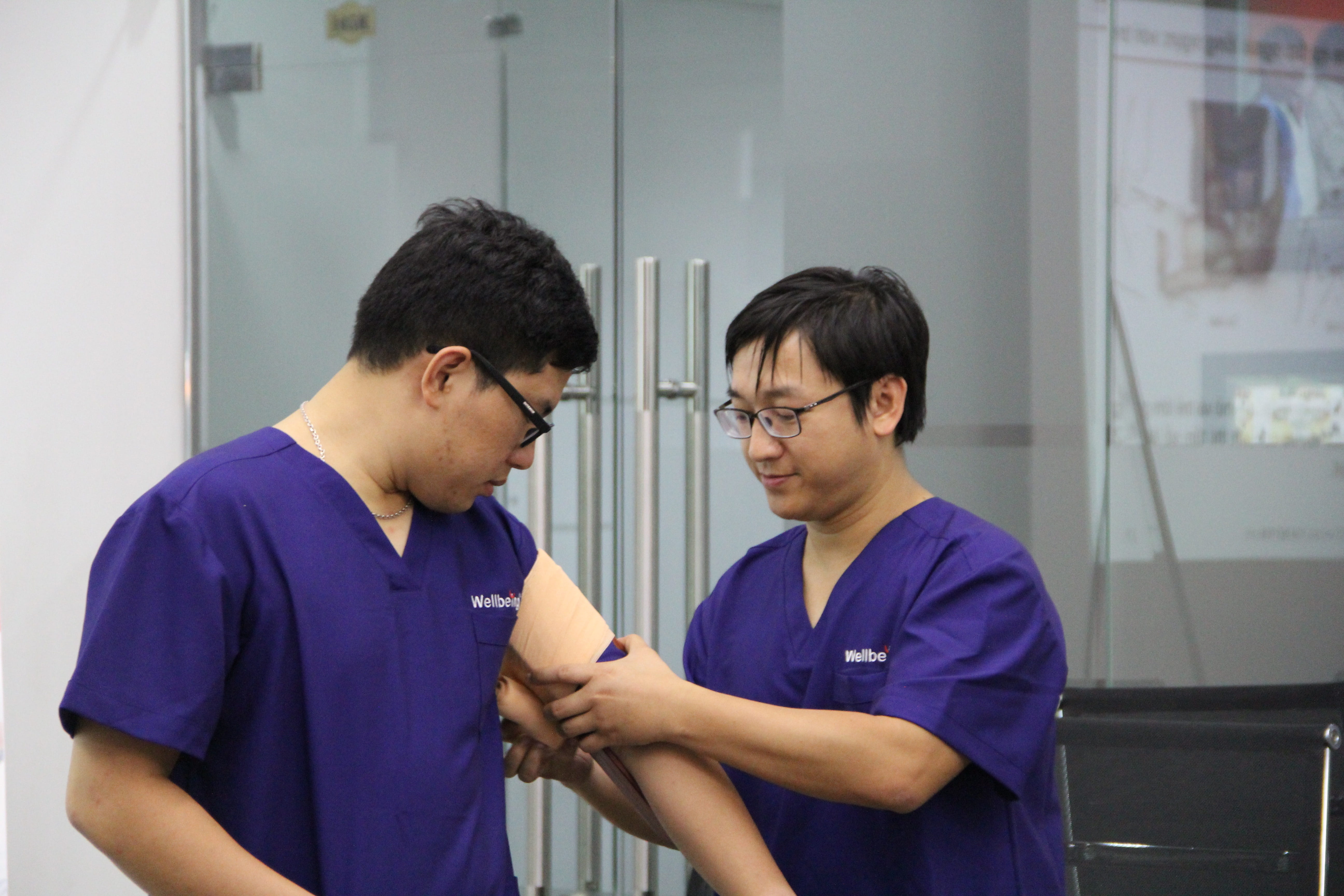 males, eyeglasses, healthcare and medicine, care, wellbeing, occupation, indoors, coworker, viet nam, scrubs, front view, standing, first aid, expertise, HD Wallpaper