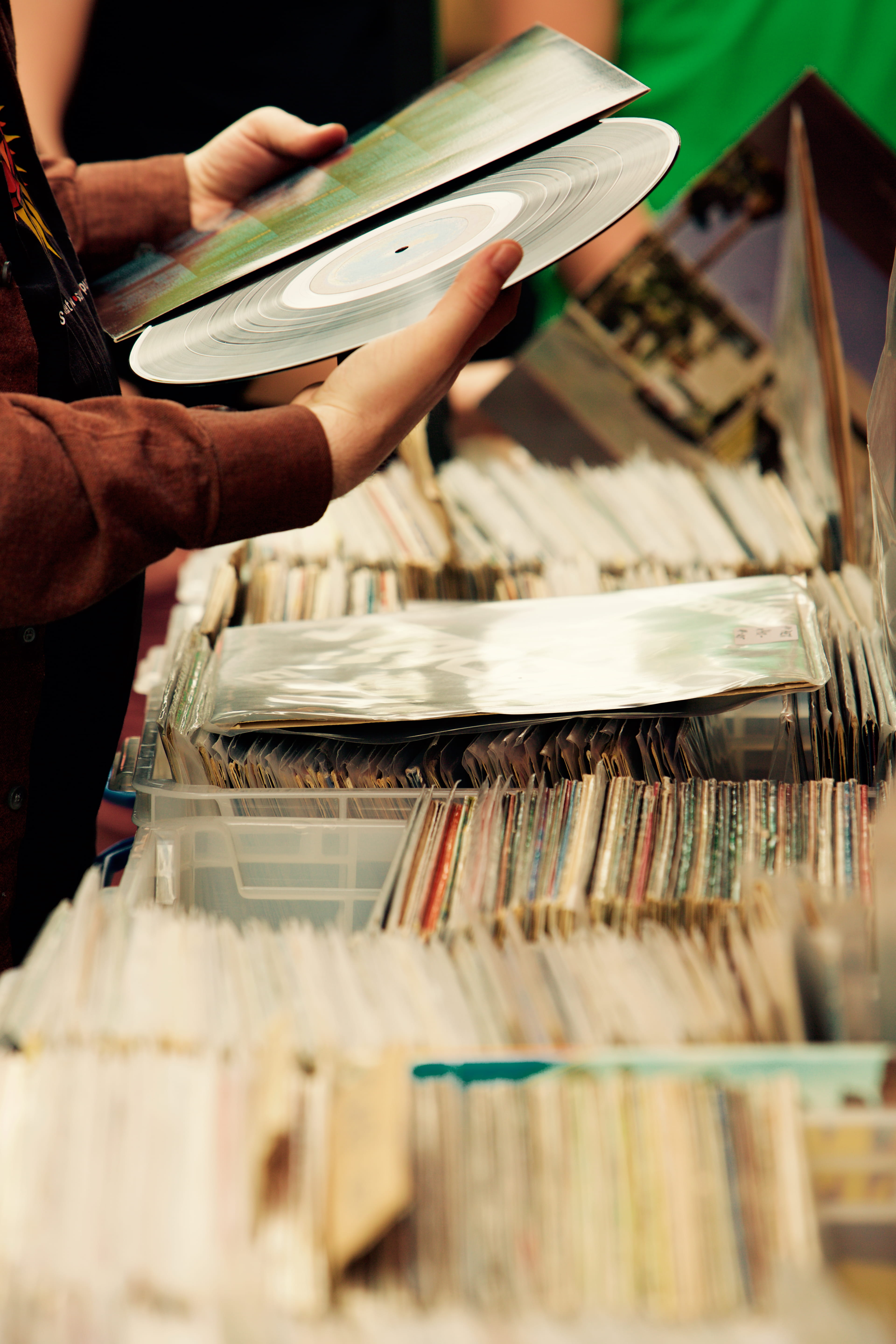 music, collection, men, real people, records, hand, vinyl, human body part, holding, business, 5K, person, large group of objects, publication, market, Phone HD Wallpaper