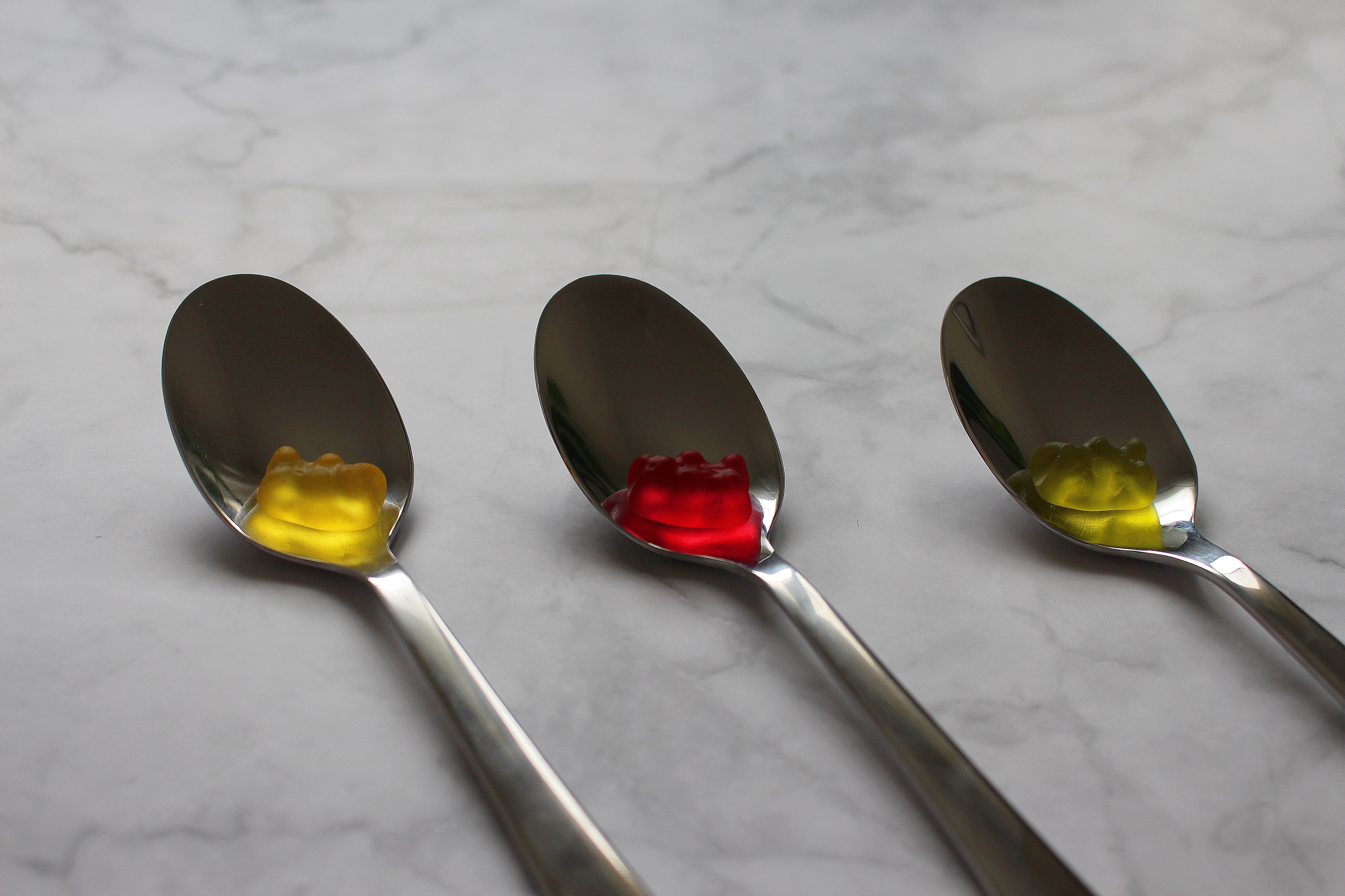 medium group of objects, kitchen utensil, red, 5K, still life, indoors, haribo, food, gummibärchen, color, table, reflection, colorful, group of objects, HD Wallpaper