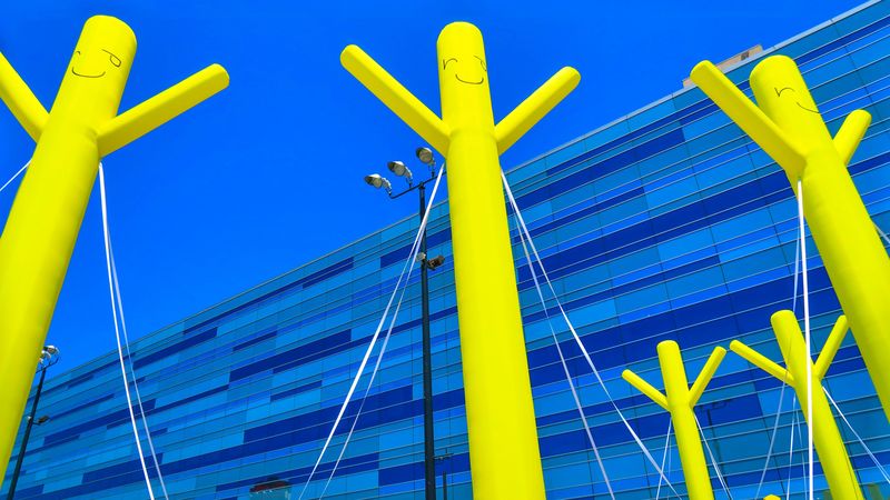 figures, smiles, decoration, yellow, building, architecture, 4k