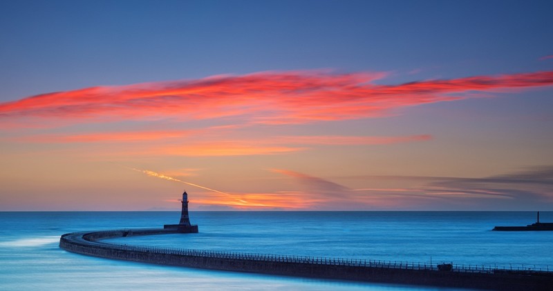 sky, colorful, sea, lighthouse, sunlight, blue, nature, sunset, horizon, calm, red, orange, orange sky, dusk, coast, clouds