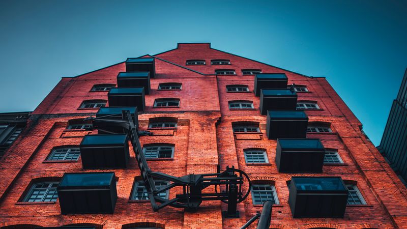building, facade, architecture, brick, windows, balconies, 4k