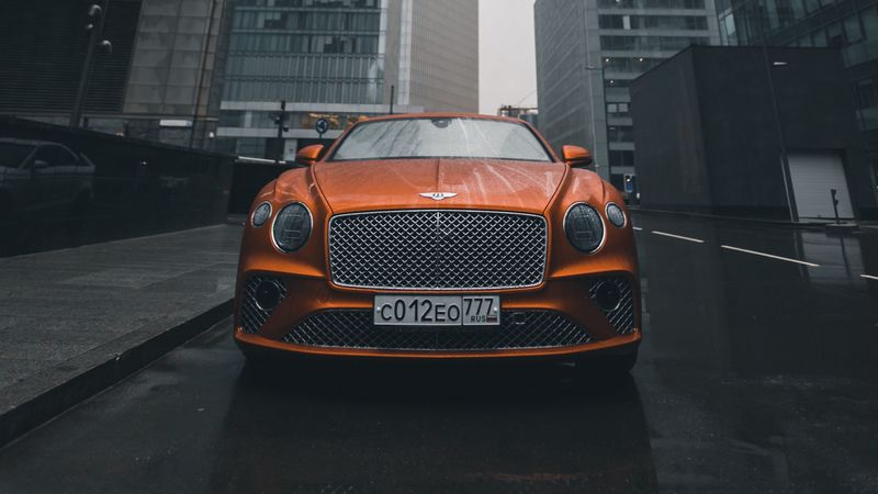 bentley continental gt, bentley, car, orange, front view, city, buildings, 4k