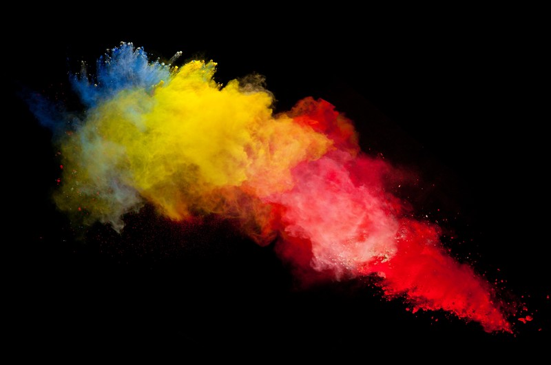 powder explosion, powder, colorful, red, black background