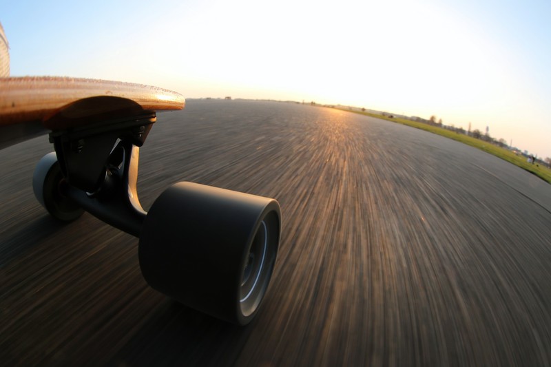 skateboard, asphalt, outdoors, sky