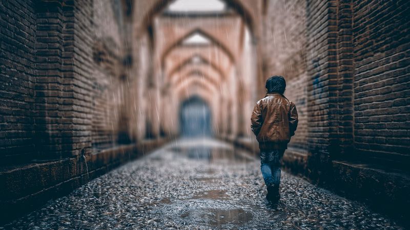 boy, street, rain, walls, arches, stone, 4k