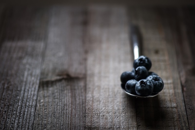 wooden surface, spoon, fruit, blueberries