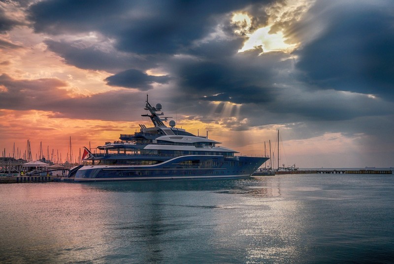 boat, vehicle, yacht, sky, water, clouds