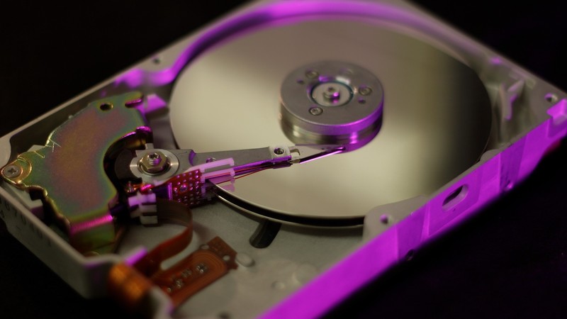 Hard drives, technology, black background, discs, digital, depth of field