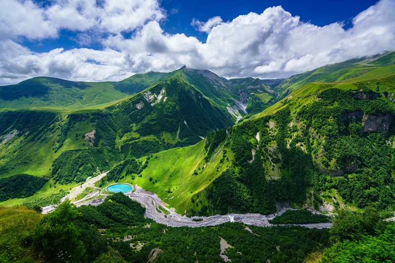 mountains, landscape, clouds, trees, paragliding, construction vehicles