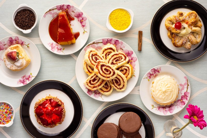 food, sweets, cake, coffee beans, rice, colorful, strawberries, flowers, vase, table, plates, fruit, cookies, top view
