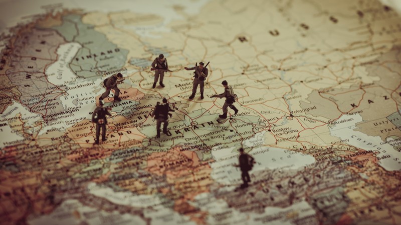 globes, continents, map, countries, miniatures, soldier, figurines, toys, depth of field, closeup, Europe, Poland, Lithuania, Ukraine, Russia, Turkey, World War II, beige