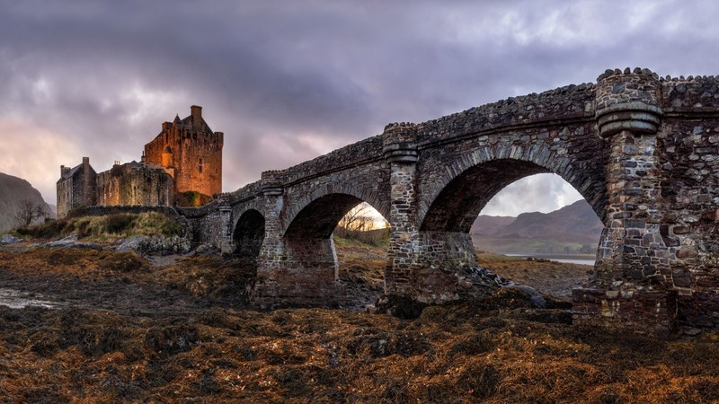 architecture, castle, medieval, Scotland, Eilean Donan, bridge, old bridge, rock, clouds, arch, hills
