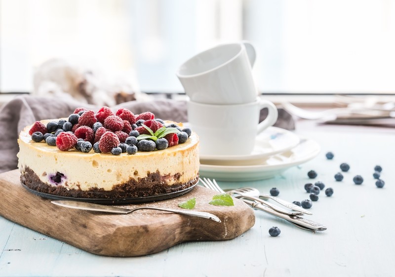 sweets, fruit, cake, berries, cutting board, raspberries, blueberries, mint leaves, sugar, coffee cup, fork