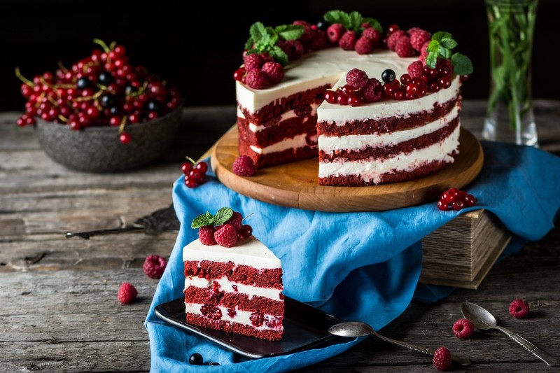 still life, food, fruit, berries, cake, raspberries, mint leaves, red currant, cutting board, spoon, wooden surface