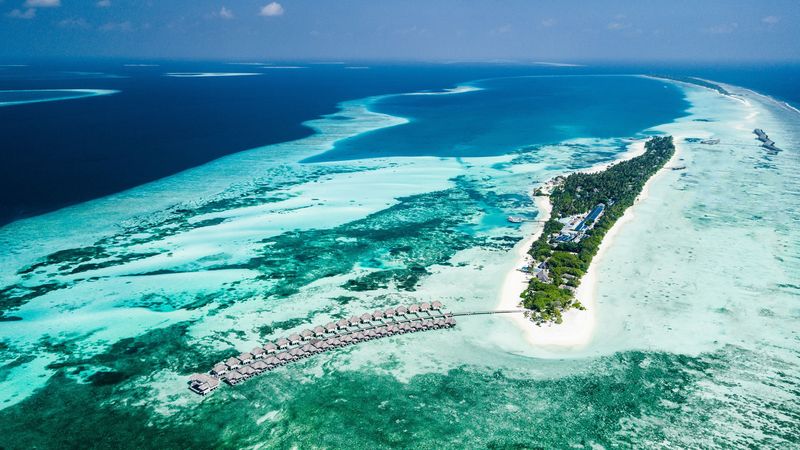 bungalow, aerial view, ocean, tropics, 4k