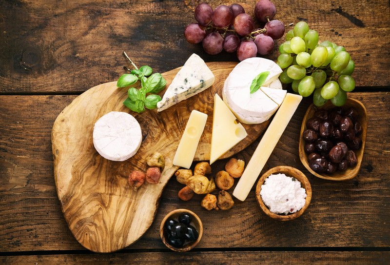 still life, food, cheese, olives, grapes, cutting board