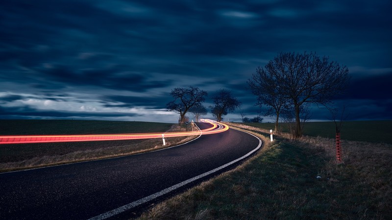 road, clouds, long exposure, night sky, asphalt, landscape, outdoors, sky, light trails, trees, evening, horizon