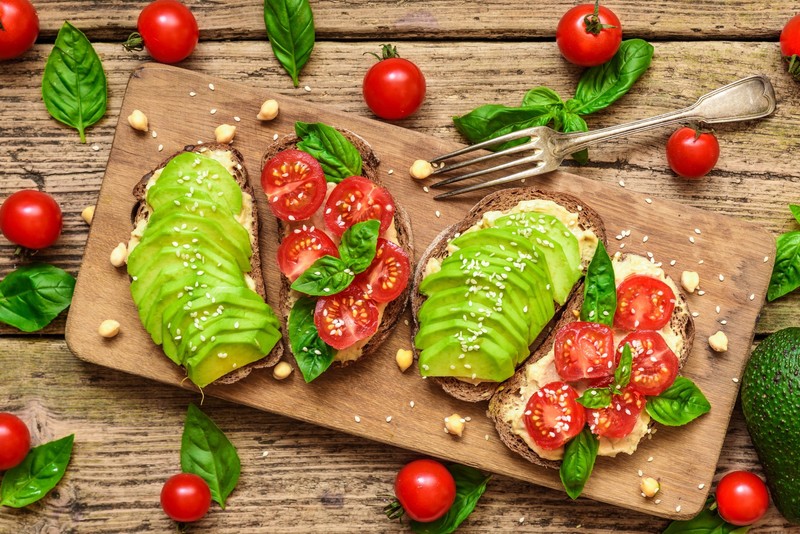 food, bread, fork, tomatoes, wooden surface, cutting board, toast, Avocado, basil