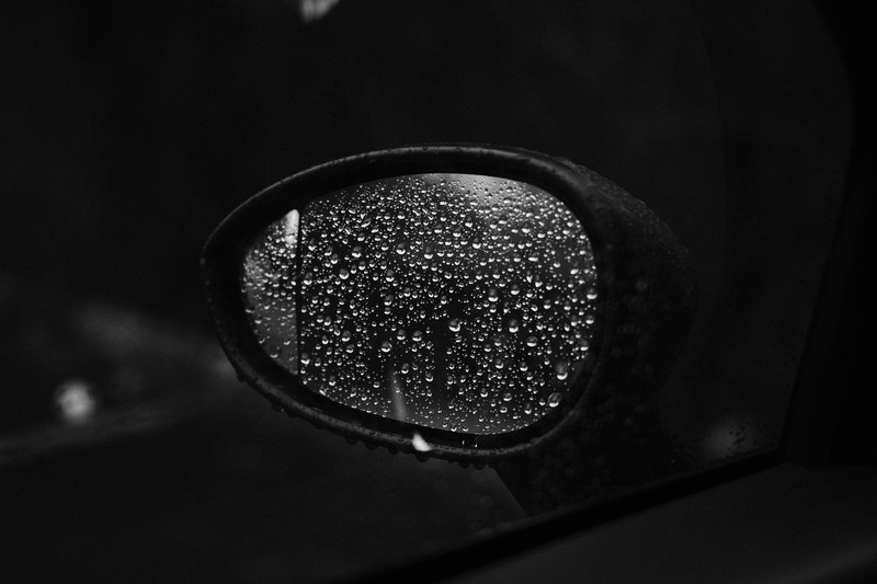 photography, monochrome, inside a car, mirror, rain