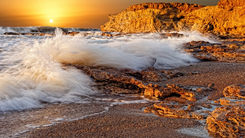 rocks, sun, rock, yellow, beautiful, sunset, clouds, sea, wave, beach, sand, splendor, beauty, cliff, reflection, lovely, view, ocean, sunlight, golden, waves, ocean waves, sky, tan, golden sunset, water, peaceful, nature
