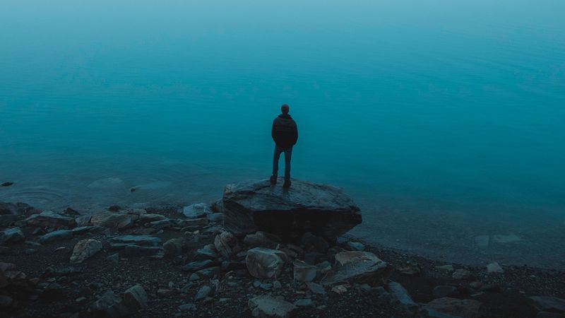 man, sea, stones, loneliness, alone, 4k