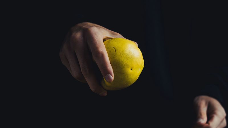 apple, hand, fruit, dark background, 4k