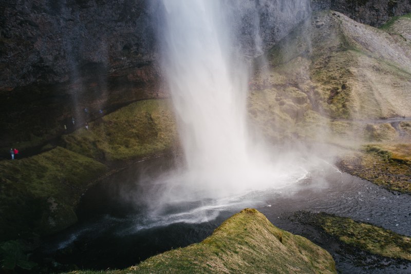 tourists near a waterfall in iceland, waterfall in iceland 4k