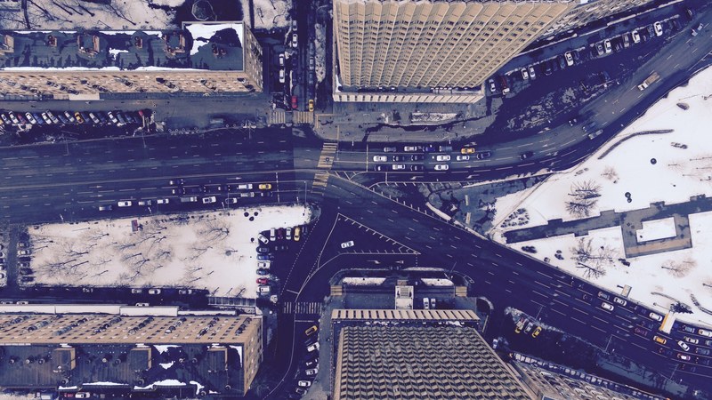 drone shot of roads surrounded by skyscrapers in daytime in moskva gorod moskva rossiya, city building aerial and road 4k