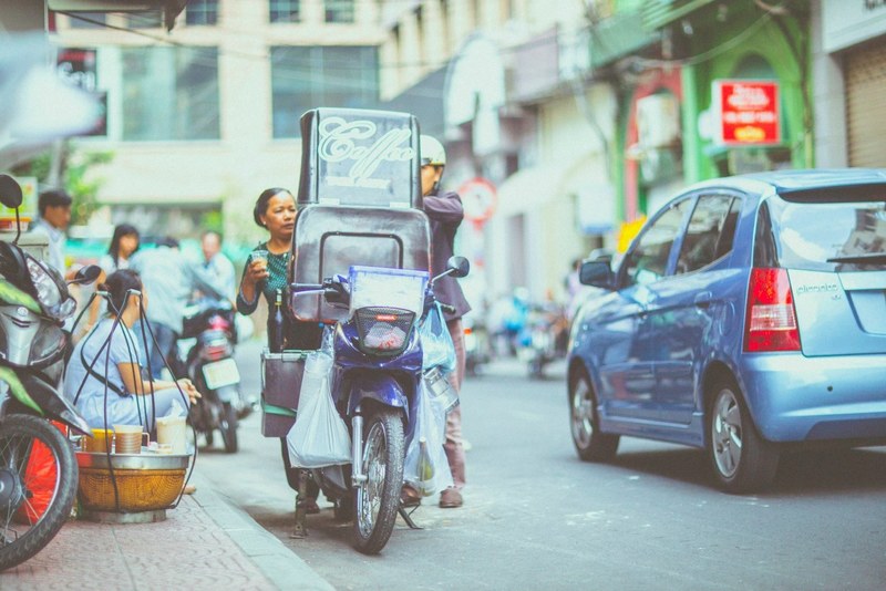 motorcycle and blue car on city street in ho chi minh city, motorcycle and car in ho chi minh city street 4k