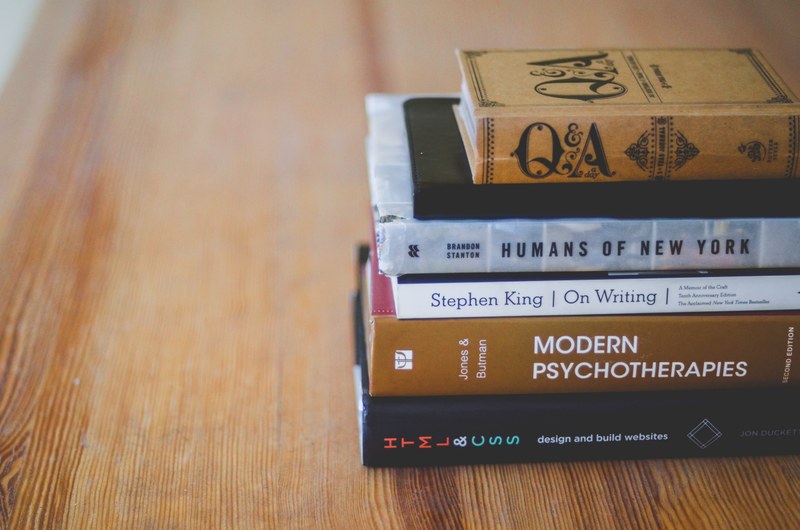 stack of books to check off the reading list, summer reading 4k