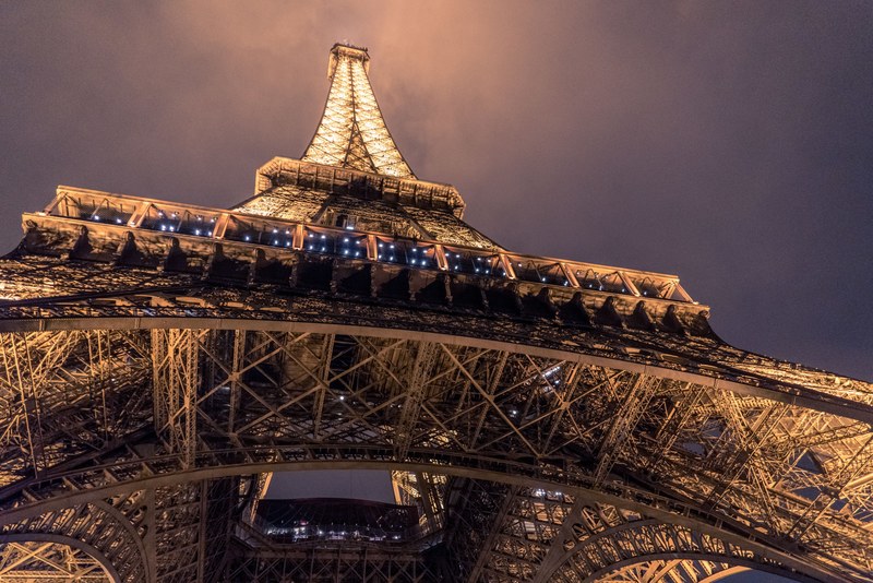 street view looking up at the inside architecture of the eiffel tower in paris france, _street view of eiffel tower 4k