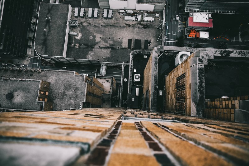 looking down at the rooftops of the buildings in cincinnati, below 4k