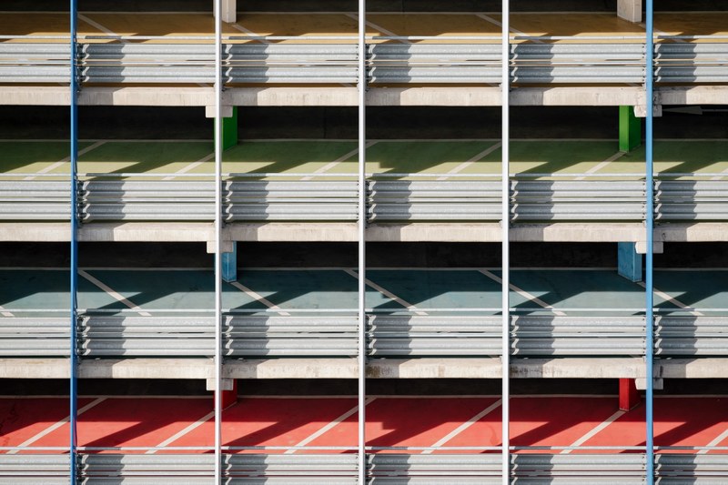 colorful lamps in a parking garage in geneva, colorful parking garage ramps 4k