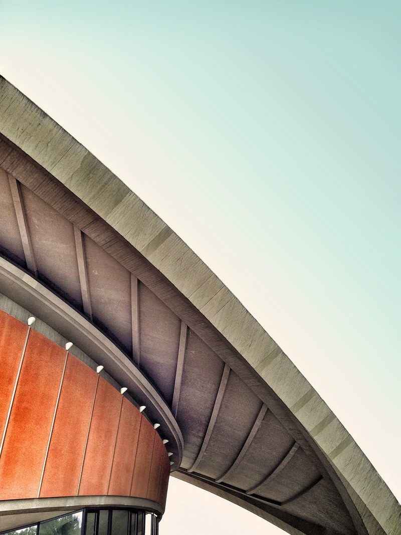 a concrete overhang in the roof of a round building, round building overhang 4k