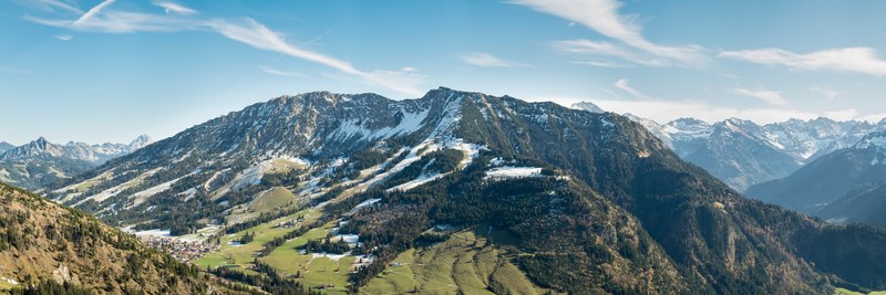 a magnificent view of a village on the slope of a mountain in oberjoch, highland village 4k