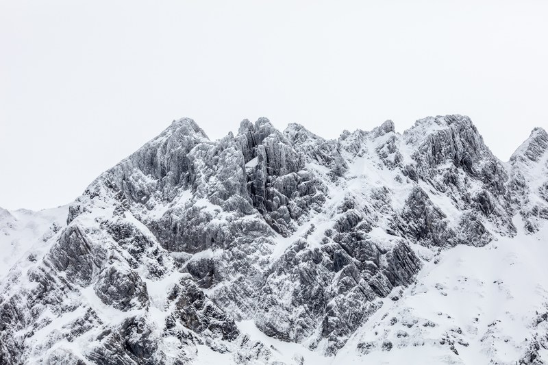 a snow capped jagged mountain ridge in schwgalp, mountains sntis 4k