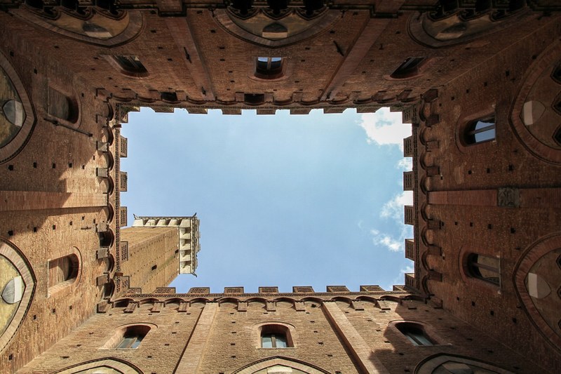 symmetrical look up sky and architecture 4k