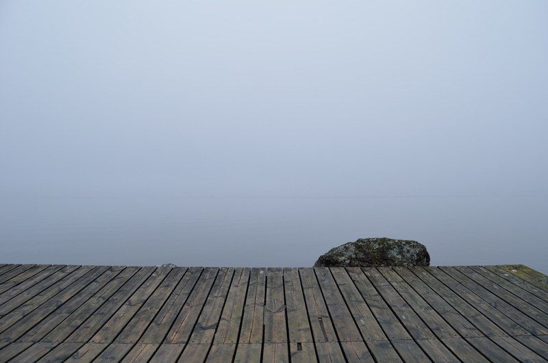 a dock on a foggy moody day, foggy dockside 4k