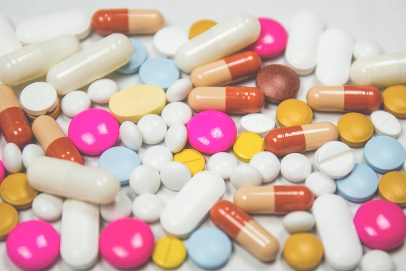 a large number of colorful pills and capsules, colorful medication 4k