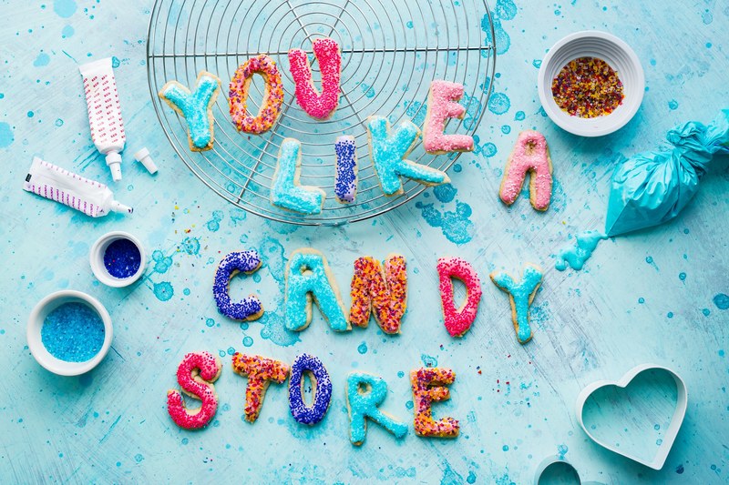 letter shaped cookies covered in colorful sprinkles spell out you like a candy store, rap cookies 4k