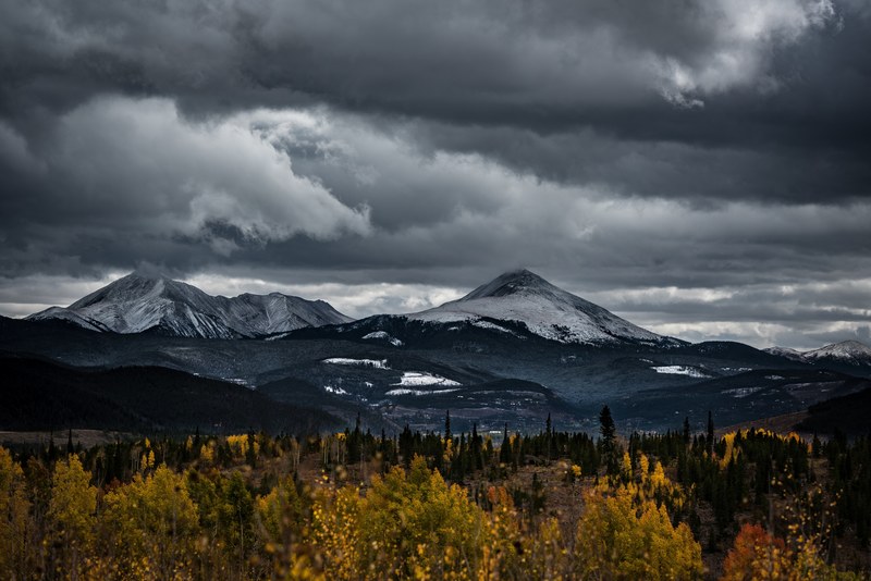 snow capped mountains under a gray sky in silverthorne, imperfect days 4k